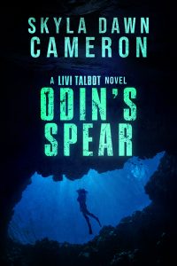 The silhouette of a woman scuba diving in the dark ocean and the title Odin's Spear.