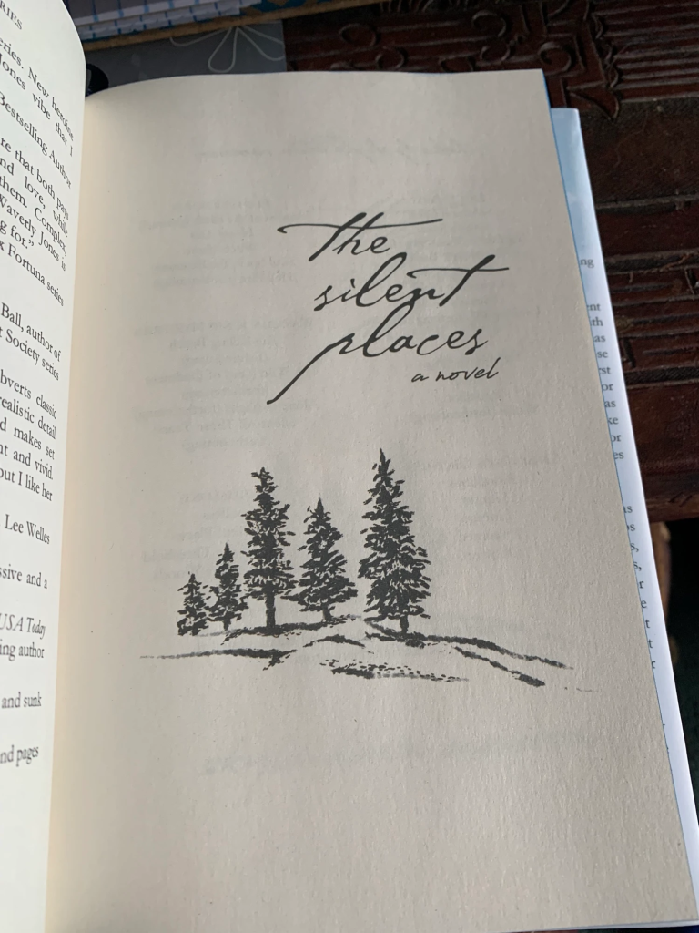 Half title page showing a sketch of trees.